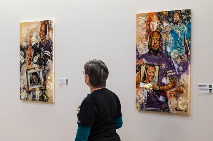 Visitor viewing the Faces of Donation exhibit